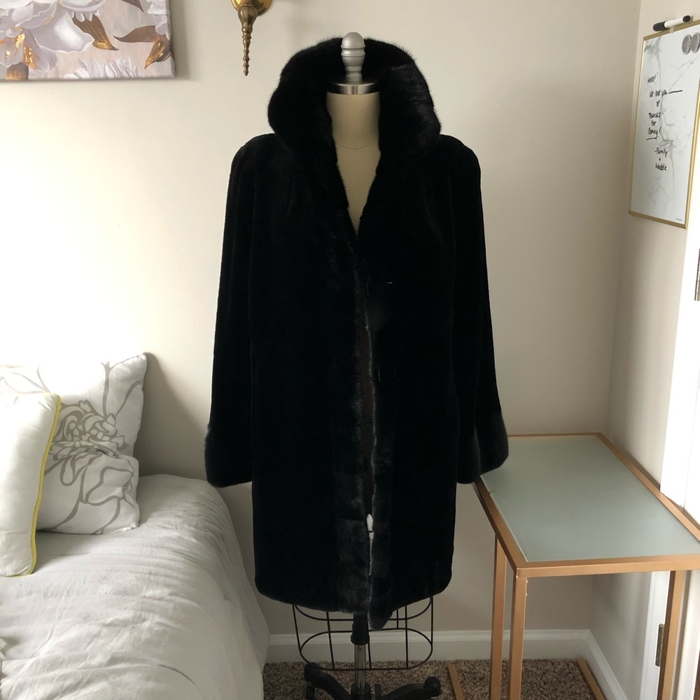 Black REAL sheared reversible fur coat.